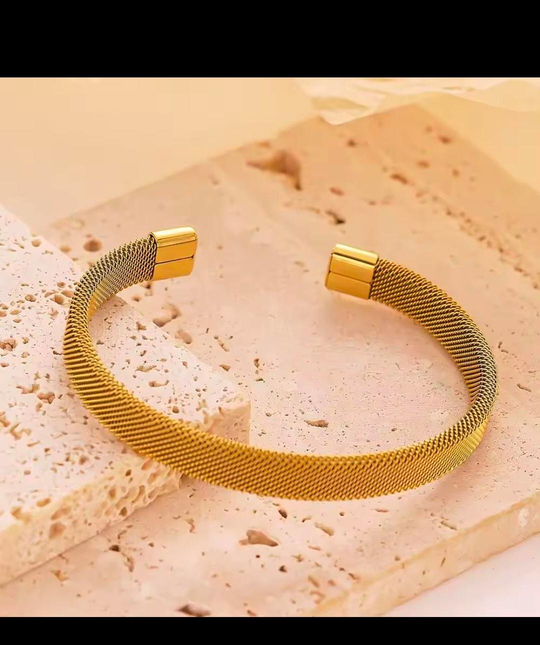 Silver and golden Handcuff